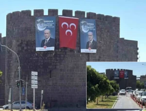 Diyarbakır’ın tarihi surlarına Devlet Bahçeli’nin posteri asıldı